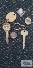 Vintage keys, Nissan, Ford, Michelin, and Datsun tags