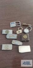 Bowling, fishing, and other money clips. keychains, pocket knives, etc.