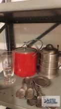 Small pewter plates, decorative spoons, ice buckets and hotel post glass