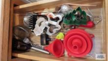 Cookie cutters, kitchen utensils and Etc in one drawer