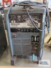 Lincoln Idealarc, model number TIG-300/300, three phase, AC/DC arc welder with cables and
