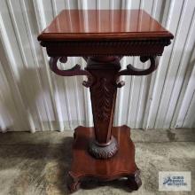 Antique ornate cherry pedestal. 36 in. tall by 16 in. wide