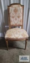 Antique chair with gold frame