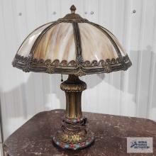 Antique slag glass lamp with metal base. lamp is 21 in. tall, base of glass is 18 in. wide