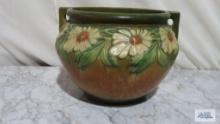 Orange and green floral planter. approximately 8-1/2 in. tall and opening 9 in. wide.
