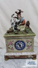 Victorian style floral clock with girl and dog figurine top. made in Italy. marked N Tiche. number