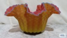 Hand blown yellow, pink and blue frilled edge centerpiece dish. approximately 6 in. tall and 11 in.