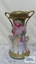 Nippon hand painted floral...gold trim...handled vase. approximately 12 in. tall, opening is 3-1/2 i