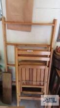 Drying rack and two wooden folding chairs