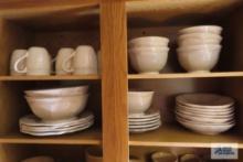 Daniel Cremieux earthenware plates. Bowls and mugs.