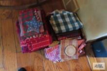 lot of placemats and tablecloths