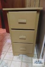three drawer wooden cabinet