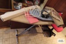ironing board with iron and etc