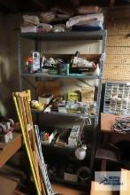 assorted hardware and plumbing supplies on shelving