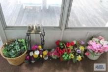Crock planter with florals, plastic rabbit figurines, wrought iron plant stand. Top needs repaired,