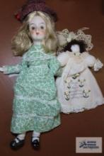 cloth doll and porcelain doll with cloth body