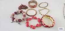 Red gemstone and beaded bracelets
