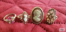 Cameo and colored gemstone rings, three rings...marked Avon