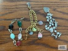 Costume jewelry charm bracelet and gemstone bracelets