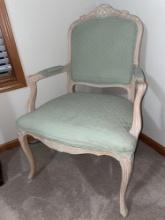 Antique cushioned chair