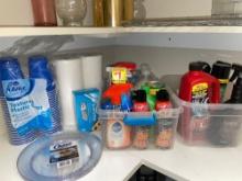 Cleaning supplies, paper towels, plastic cups and cutlery