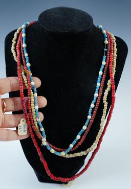 Set of 4 Strands of assorted Trade Beads. The largest is 26".