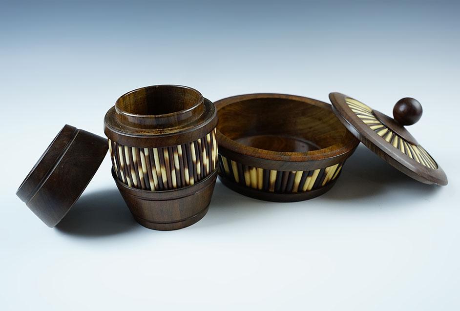 Contemporary but nice! Pair of wood and quillwork lidded bowls made in Ethiopia.