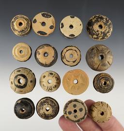 Group of 16 Pre-Columbian spindle whorls recovered in Mexico. Largest is 1 1/4".
