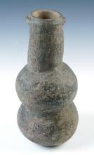 7 3/4" tall Shell tempered clay Compound Bottle with dimpled base. Found in Tiptonville, TN.
