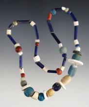 13" Strand red & blue Straw, Shell Wampum and Disc, Redwood, "Dutch" blue & Seed Beads.