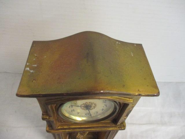 Child Playing with Clock Pendulums Cast Iron Clock