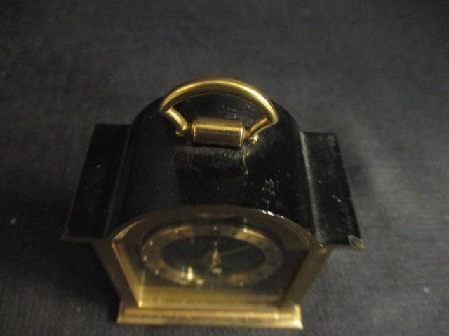 Swiss Black & Brass Arch Top Miniature Clock (Dots are Uranium Glass)