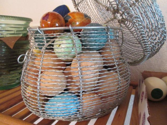 Wire Egg Basket and Large Collection of Stone, Wood and Paper Mache Eggs