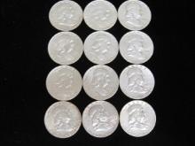 Lot of (12) Franklin Half Dollars