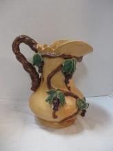 Large Pottery Pitcher with Applied Grape Clusters