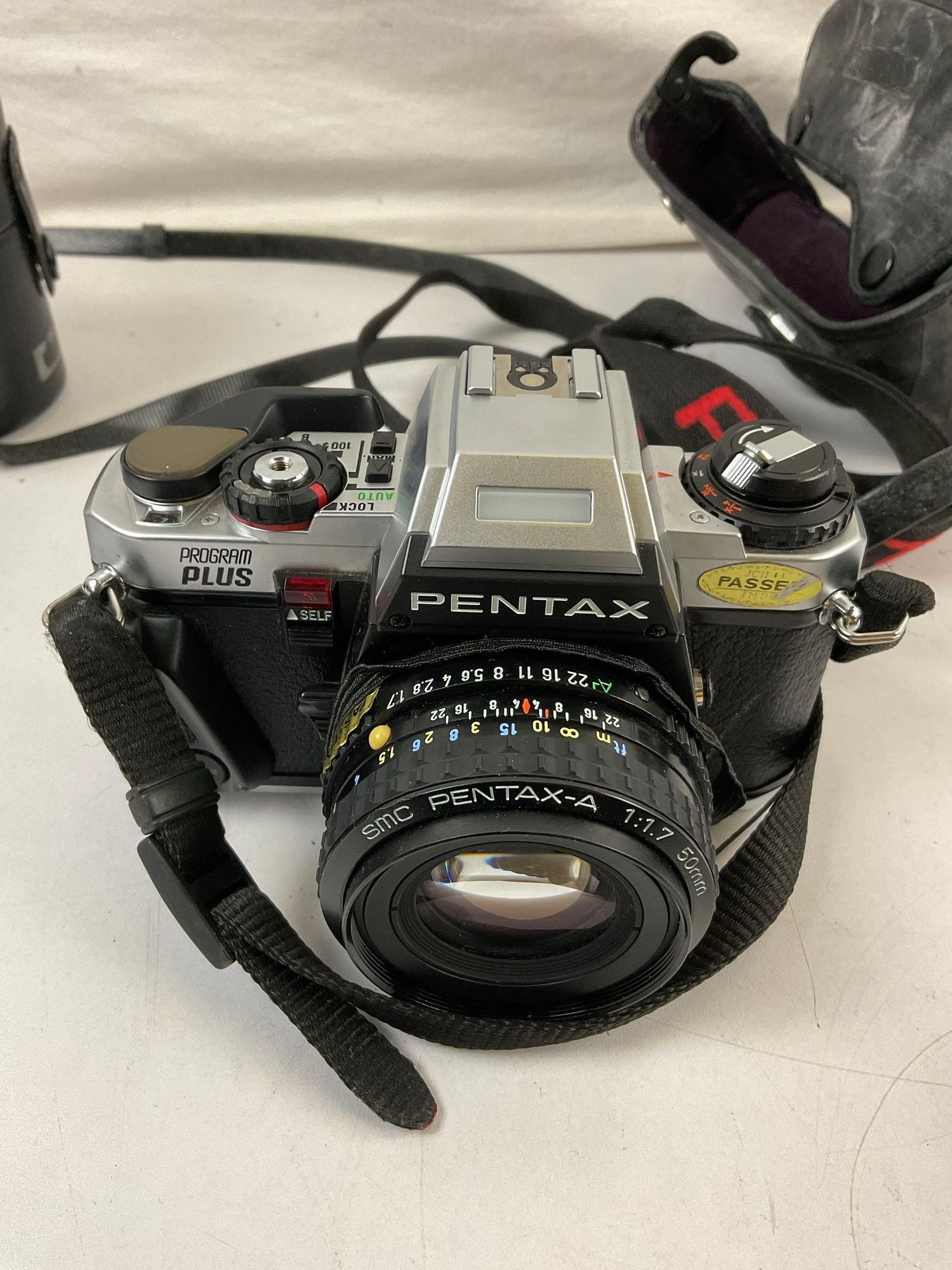 9 pcs Vintage Pentax Film Camera Assortment. Pentax Program Plus 35mm Camera. 3 Zooms. See pics.