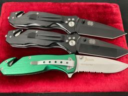 Assortment of 7 Knives, Army, Swat, Marines, Firefighter branded Folding Knives