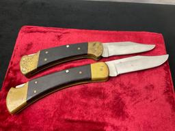 Pair of Buck Folding Hunting Knives, Wood, Brass, and Stainless Steel, #s 110 & 112