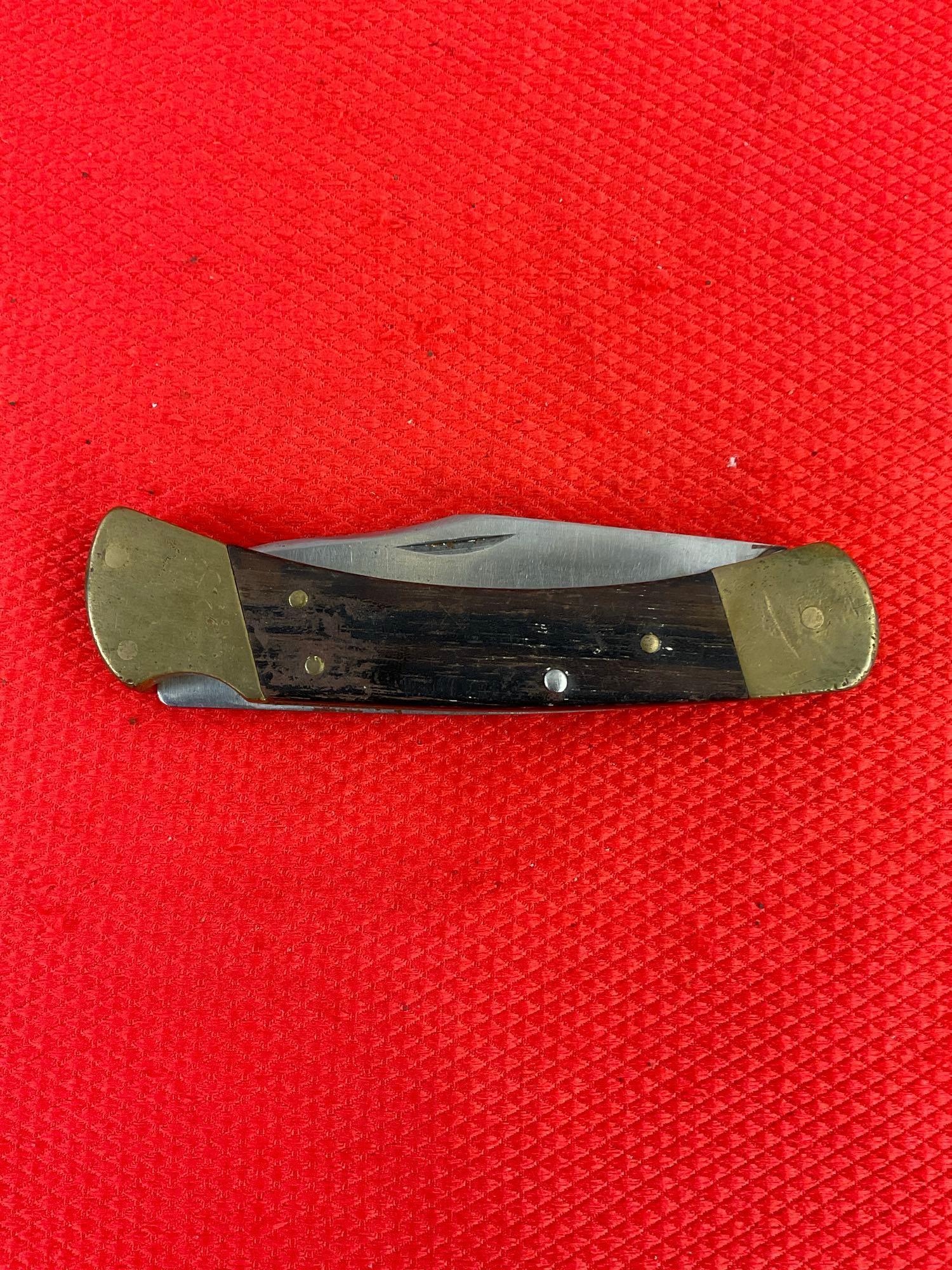 Vintage Buck 3.75" Steel Folding Blade Pocket Knife Model 110 w/ Ebony Handle & Sheath. See pics.