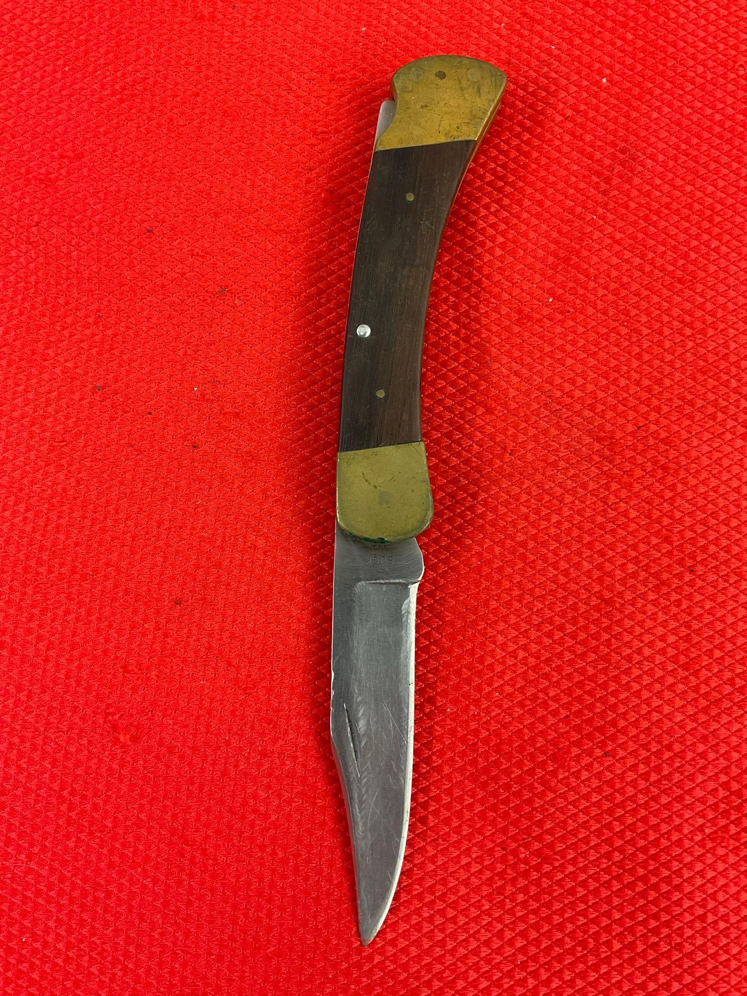 Vintage Buck 3.75" Steel Folding Blade Pocket Knife Model 110 w/ Ebony Handle & Original Sheath. ...