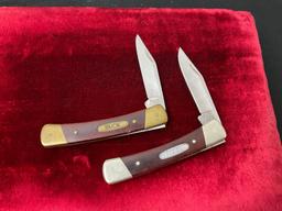 Pair of Vintage Buck 704 Single Blade Folding Pocket Knives Slip Joint, one w/ Brass metal