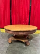Vintage Low Round Wooden Coffee Table w/ Wheels & Pedestal Base. Measures 35" x 18" See pics.
