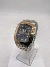 Men's Croton Solar two-tone stainless steel water resistant watch in good cond