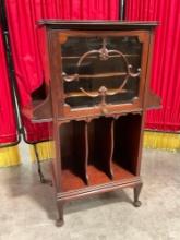 Vintage Wooden Record Cabinet w/ Glass Fronted Cupboard, Fold Away Door & 7 Compartments. See pics.
