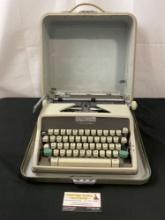 Vintage 1961 Olympia Portable Typewriter SM7 in Case, White in color