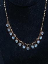 Jewelry-Gold Tone Enameled Hanging Hearts Necklace marked Kingston, NY