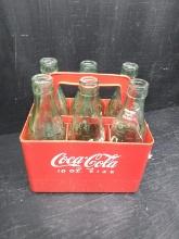 Red Plastic Coca Cola Crate with Assorted Soda Bottles