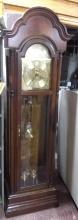 Contemporary Mahogany Howard Miller Grandfather Clock with Phase Positioning Brass Dial