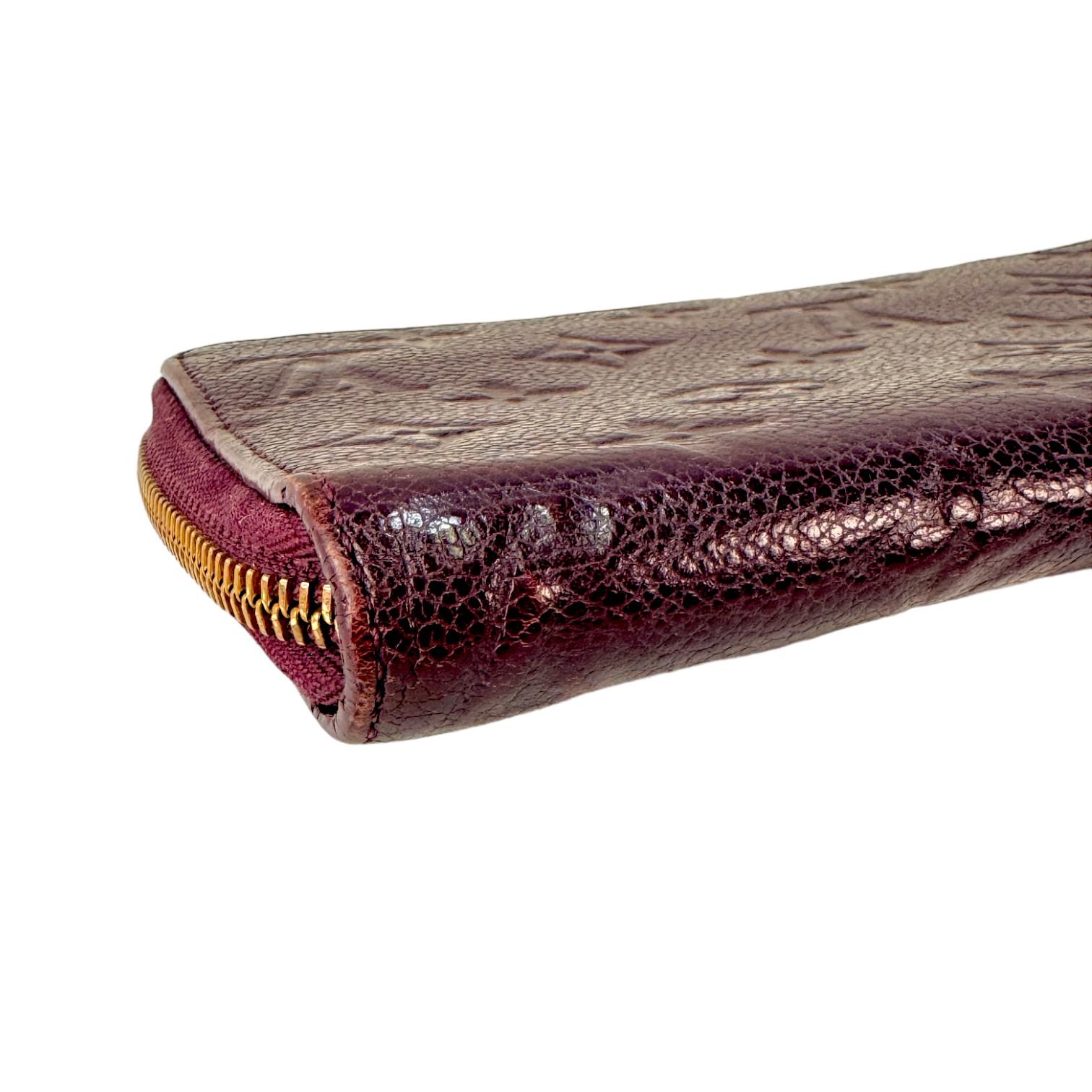 Authentic estate Louis Vuitton Empriente Zippy purple leather wallet