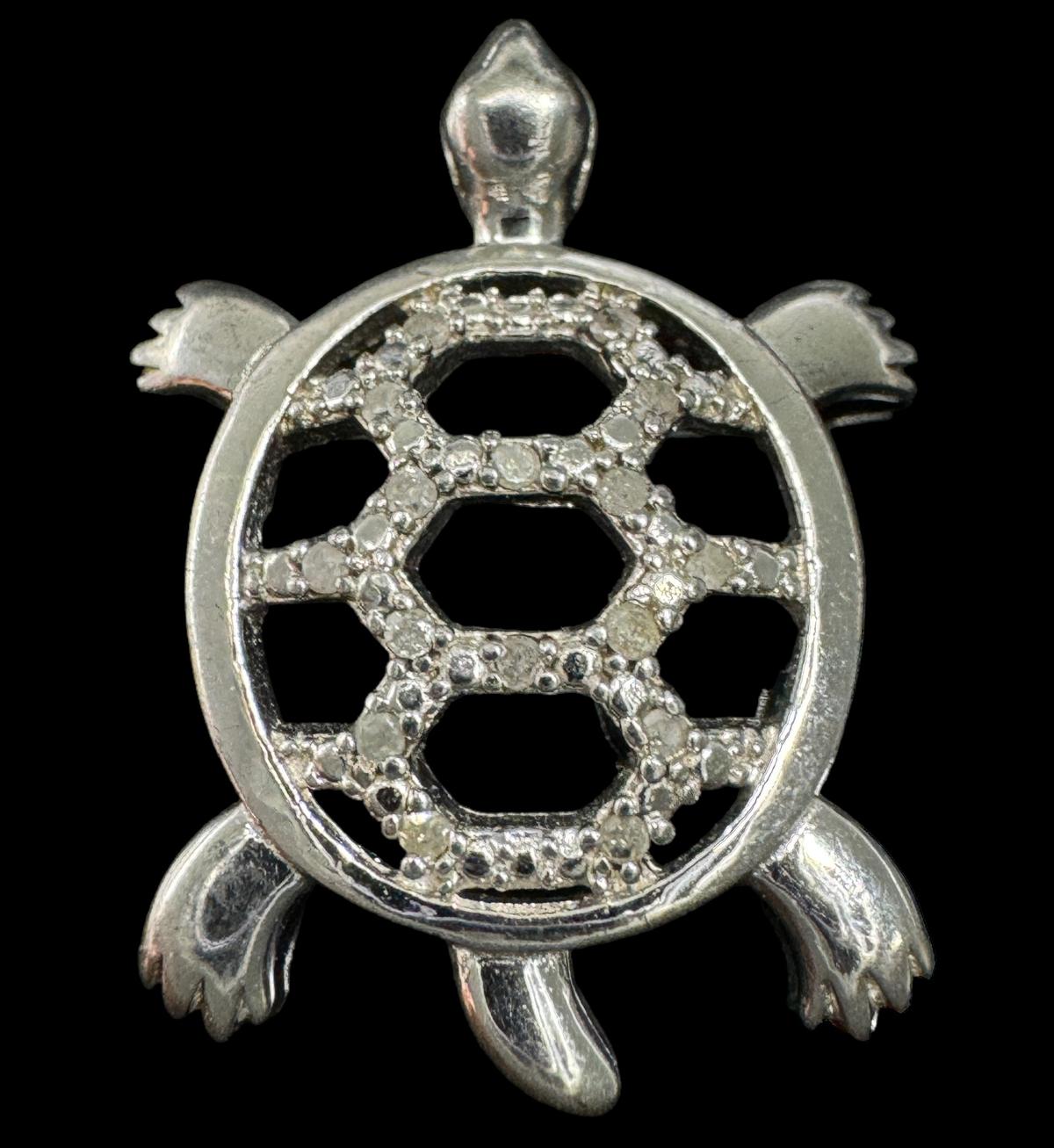 Estate sterling silver diamond pendant